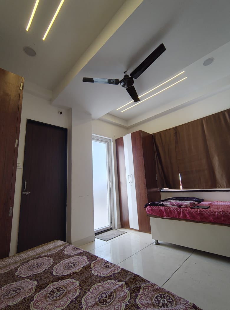 Open wardrobe with shelves and drawer